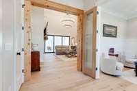 You will be drawn to the beauty of nature as you step inside the spacious foyer and see the private views on the other side of the home.