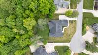 Acres and acres of trees behind this home offer a great deal of privacy!  Being near the end of the cul de sac also eliminates excess traffic, providing a peaceful location both front and back!