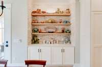 This gorgeous custom built-in with open shelving is just the icing on the cake!