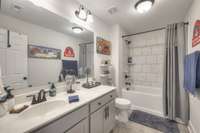 Upstairs bath with tile surround