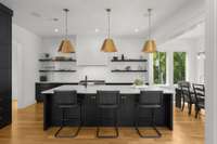 Eat-in oversized island w additional storage cabinets
