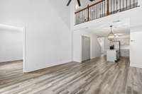 Bright, open floor plan with LVP flooring throughout