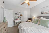 Another angle of large primary bedroom