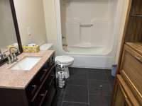 Hall Bath with access to the Bedroom by the tub.