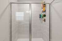 Master suite walk-in shower with glass doors