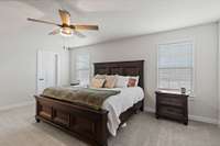 The Master suite is large and luxurious! Features upgraded lighting, tile bathroom with walk-in shower, double quartz vanities with tons of storage, and 2 large walk-in closets!
