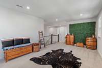 At the top of the stairs you are first greeted by the large sunny bonus room!