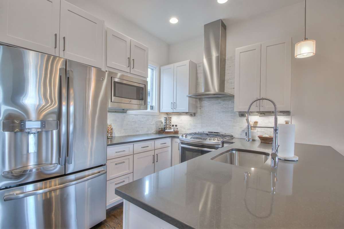 Like new stainless steel appliances and gas range