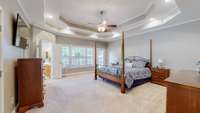~  HUGE Primary Bedroom On Main Level With Double Tray Ceiling & Tons Of Lighting ~