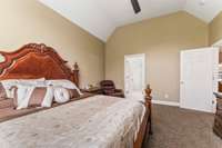 Another view of the primary bedroom looking toward the bathroom