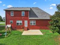 There is a patio and plenty of space to garden or play