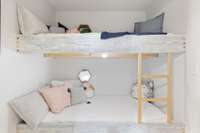 Upstairs Guest room with built in kid bunks