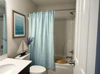 Virtually staged - second floor hall full bathroom