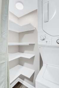 Great storage in this pantry! Washer and dryer included!