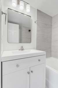 Modern and freshly updated primary bathroom!