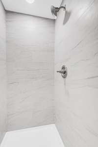 Beautifully done walk-in tile shower