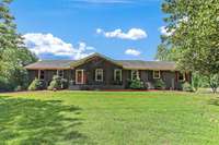 Grand Ranch Home! Almost 2300 sq ft upstairs on the main level, with 1360 sq ft finished basement AND this home still have a HUGE unfinished Walk-out garage in the Basement! Great floorpan with TONS of space!