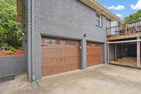 Newer garage doors are beautiful! There's also a walk-out door off the side on the left (not pictured).