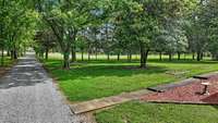 Front yard has a tree line that gives TOTAL PRIVACY!