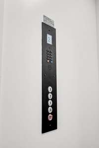 The elevator allows access to every floor including the garage.