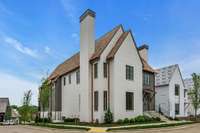 This corner lot home allows for privacy, ample natural light, and low maintenance living.