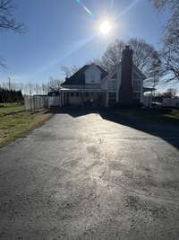 Back of Home with 2 Car Carport