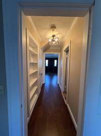 Hall from Bedroom with Built-In Shelf