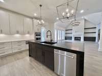 Step into your dreamy gourmet kitchen, where culinary aspirations come to life amidst a backdrop of exquisite design and unparalleled functionality. TO BE BUILT - Buyer can customize ALL structural & designer options.