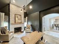 A study is a sanctuary for the mind, a place where ideas flourish & intellect thrives. This intimate space showcases vaulted ceiling, fireplace and built-ins and serves as a retreat for creative endeavors & quiet contemplation.