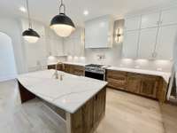 Enjoy preparing meals in this amazing open culinary sanctuary! All Photos of Similar Homes & For Representation Only. All Colors, Finishes, Options, Materials & Upgrades Will Vary Based on Buyers Customizations & Selections.