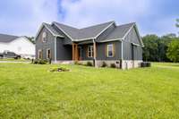 View of side of home with both HVAC units