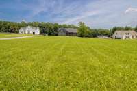 Photo showing off large front yard