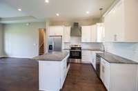 Great design with all your appliances in all the right places for easy maneuvering in the kitchen