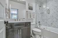 Designed for the utmost privacy and comfort, the private en suite guest bath provides a quiet oasis where guests can escape and unwind in peace. TO BE BUILT - CONSTRUCTION HAS NOT STARTED