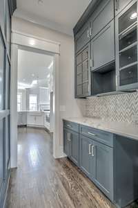 Experience the epitome of sophistication and hospitality in your butler's pantry—a stylish and functional space that enhances your hosting experience. TO BE BUILT - CONSTRUCTION HAS NOT STARTED