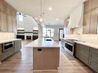 This phenomenal chef's kitchen is meticulously crafted with the finest details, ensuring a seamless blend of luxury and practicality. TO BE BUILT - Buyer can customize ALL structural & designer options.