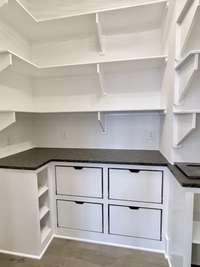 Experience the luxury of a well-designed working pantry, where organization meets efficiency. This thoughtfully crafted space goes beyond simple storage
