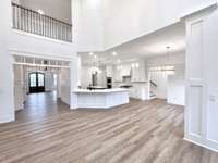 Characterized by its open concept layout, the great room seamlessly integrates multiple living areas into one cohesive space. TO BE BUILT - CONSTRUCTION HAS NOT STARTED