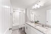 Extra upstairs bath with double vanities