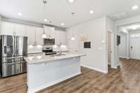 Kitchen island and stainless appliances