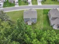 Tree-lined lot gives privacy
