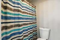 Full bathtub/shower in the apartment bathroom for comfort and convenience.