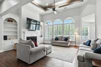 From book club to game night, this light-filled living room is open, inviting, and full of charm.