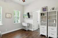 This door in bedroom 3 leads to a private powder room, and to the tiled shower shared with bedroom 2.