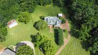 Located on a cul-de-sac on a quiet country road, but less than 10 minutes to shopping and restaurants!