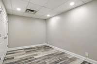 This flex room contains two huge closets and has all kinds of potential for use as a gym, office, study, or craft room.