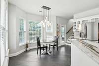 Start your mornings with sunlight and serenity in this cozy breakfast nook