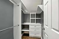 The upstairs bedroom also has a custom walk-in closet with smart built-ins and room to spare.