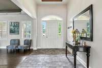 Step into a space that feels both grand and grounded, with classic brick tile underfoot.
