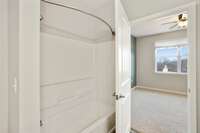 A shower/tub combo offers versatility.
